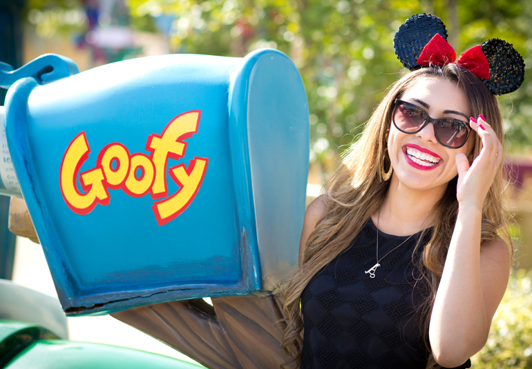 Alexis Alcala Laughing Next to Goofy's Mailbox in Toowntown at Disneyland