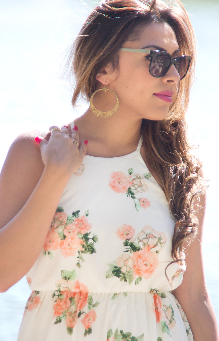 A Photo of Alexis Alcala at Yorba Regional Park as She Models a Floral Dress for Her Blog