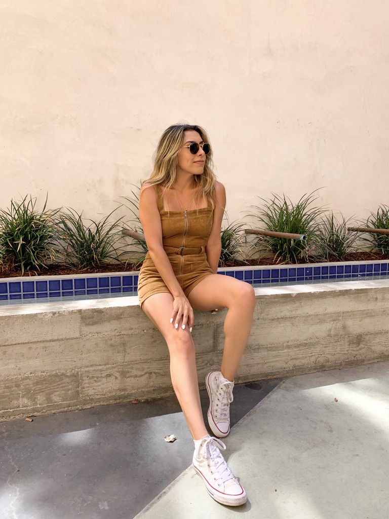 Alexis Alcala wearing a corduroy romper from summer to fall 
