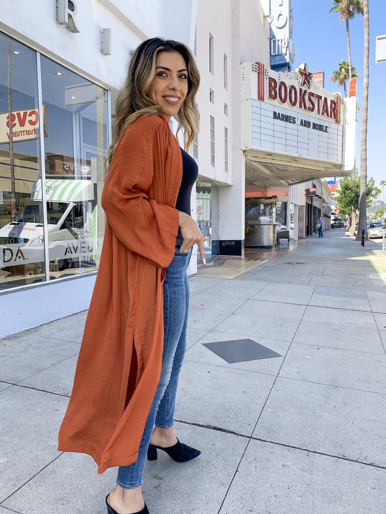 Alexis Alcala wearing a silk duster for fall 2019